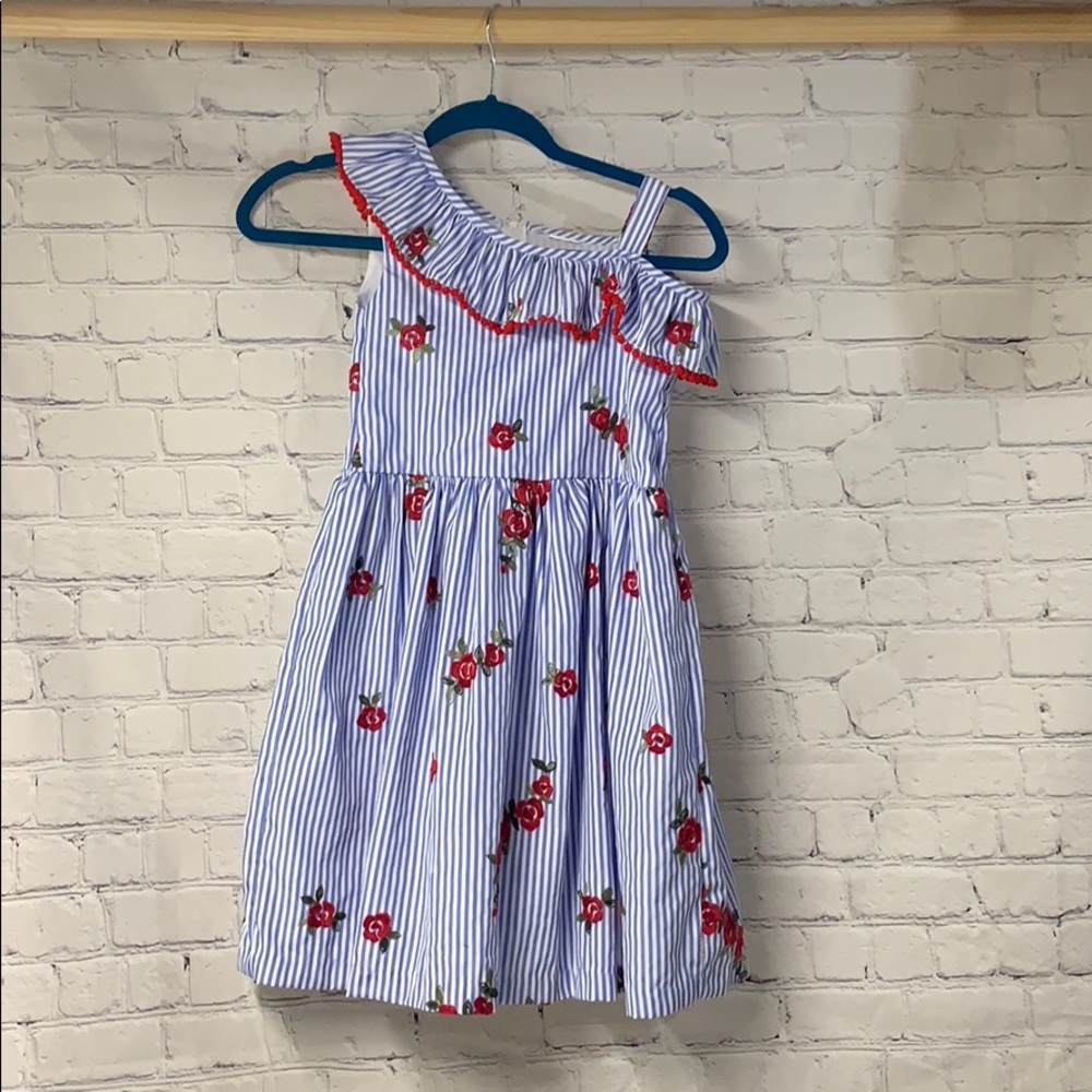 Girls dress with embroidered flower design